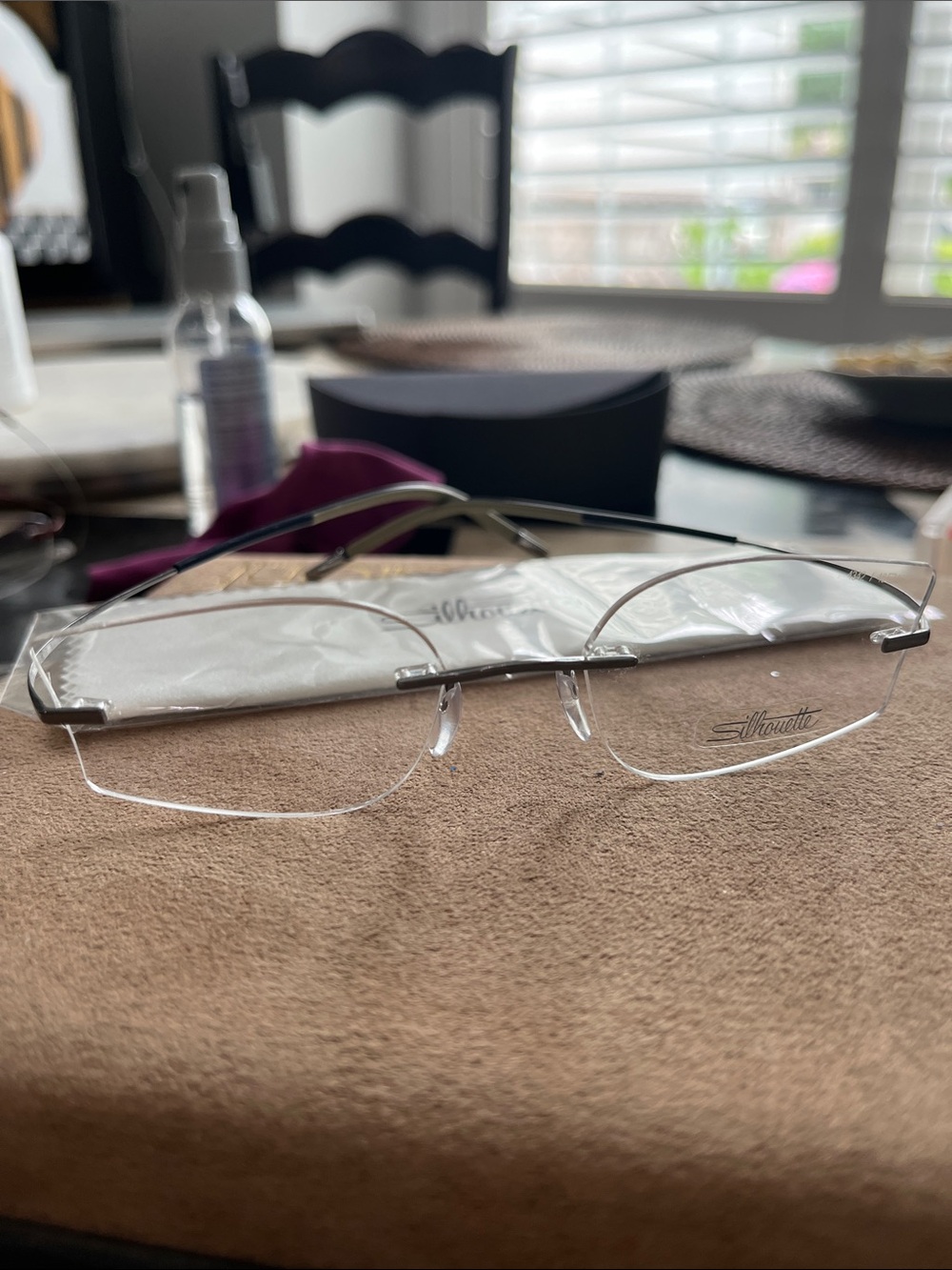Silhouette Titanium 4342 48/17/145 Rimless Glasses shiny silver ,Demo Lens